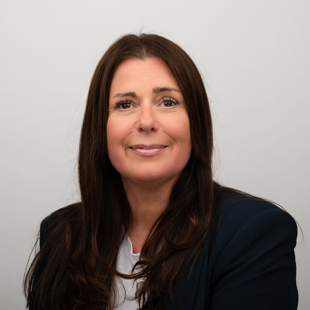 Headshot of Sarah Child, a professional counsellor and psychotherapist offering counselling services in Surrey, Godalming, and Headley.