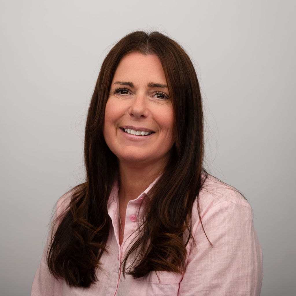 Headshot of Sarah Child, a professional counsellor and psychotherapist offering counselling services in Surrey, Godalming, and Headley.