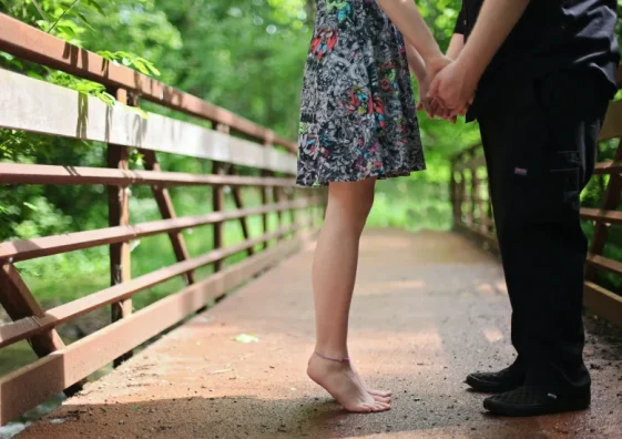 Couple holding hands - Strengthening relationships through couple counselling in Surrey, Godalming, and Headley.